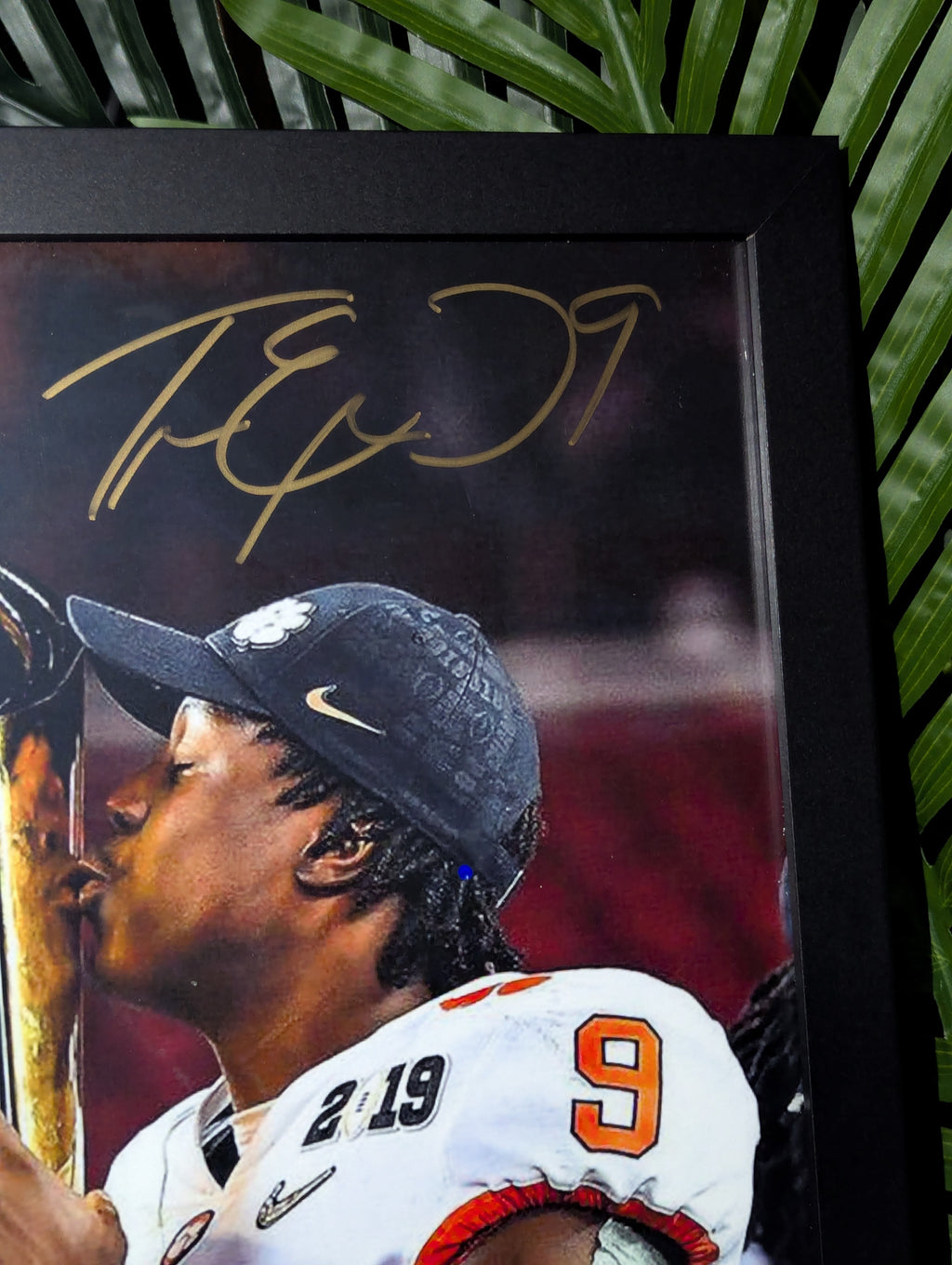 Signed Travis Etienne 11x14 (JSA)