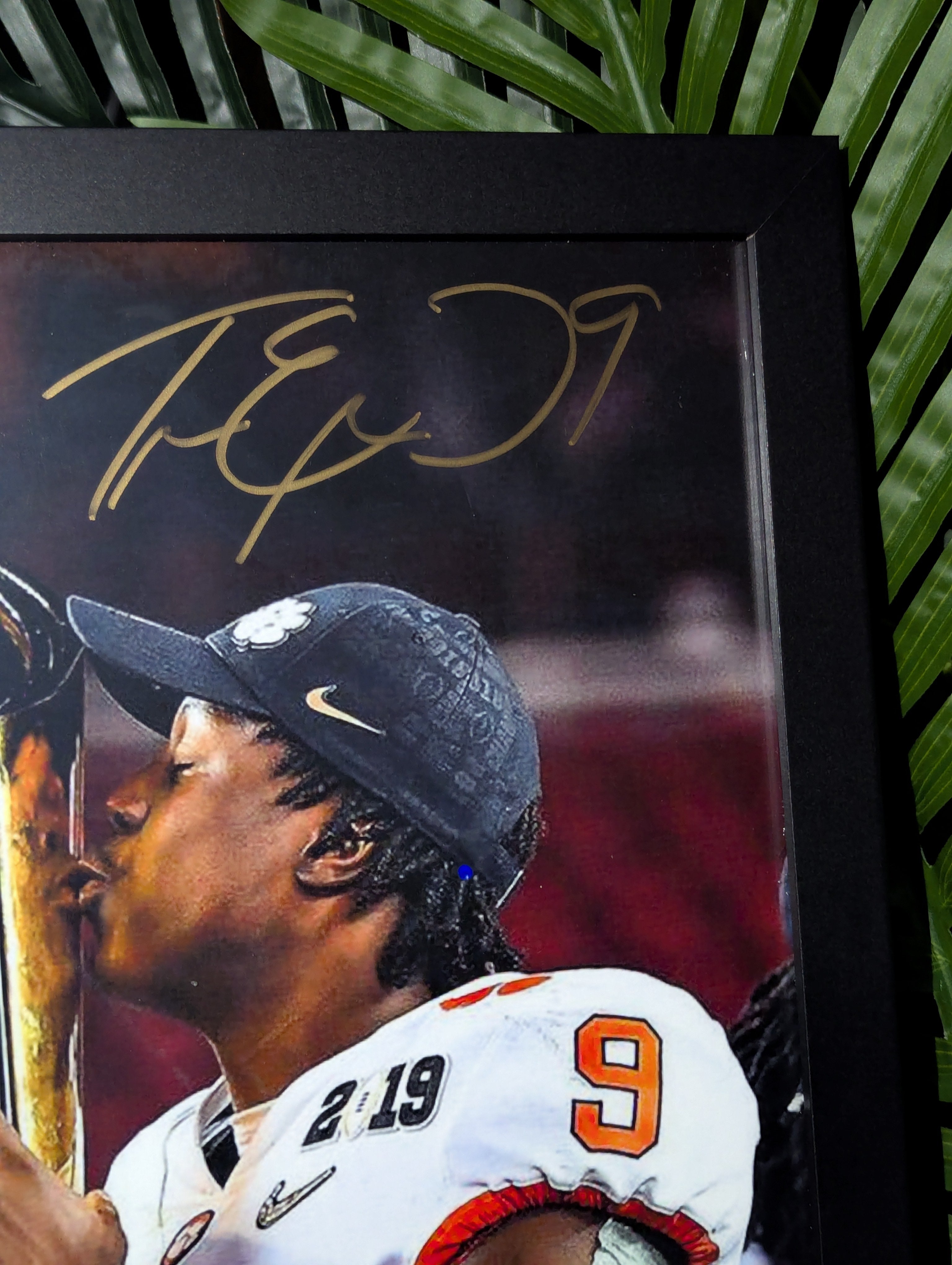 Signed Travis Etienne 11x14 (JSA)