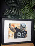 Signed Maxx Crosby 8x10 (JSA)
