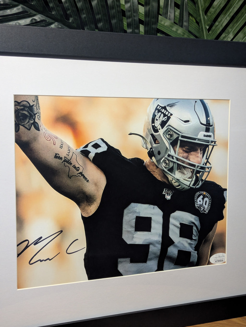 Signed Maxx Crosby 8x10 (JSA)