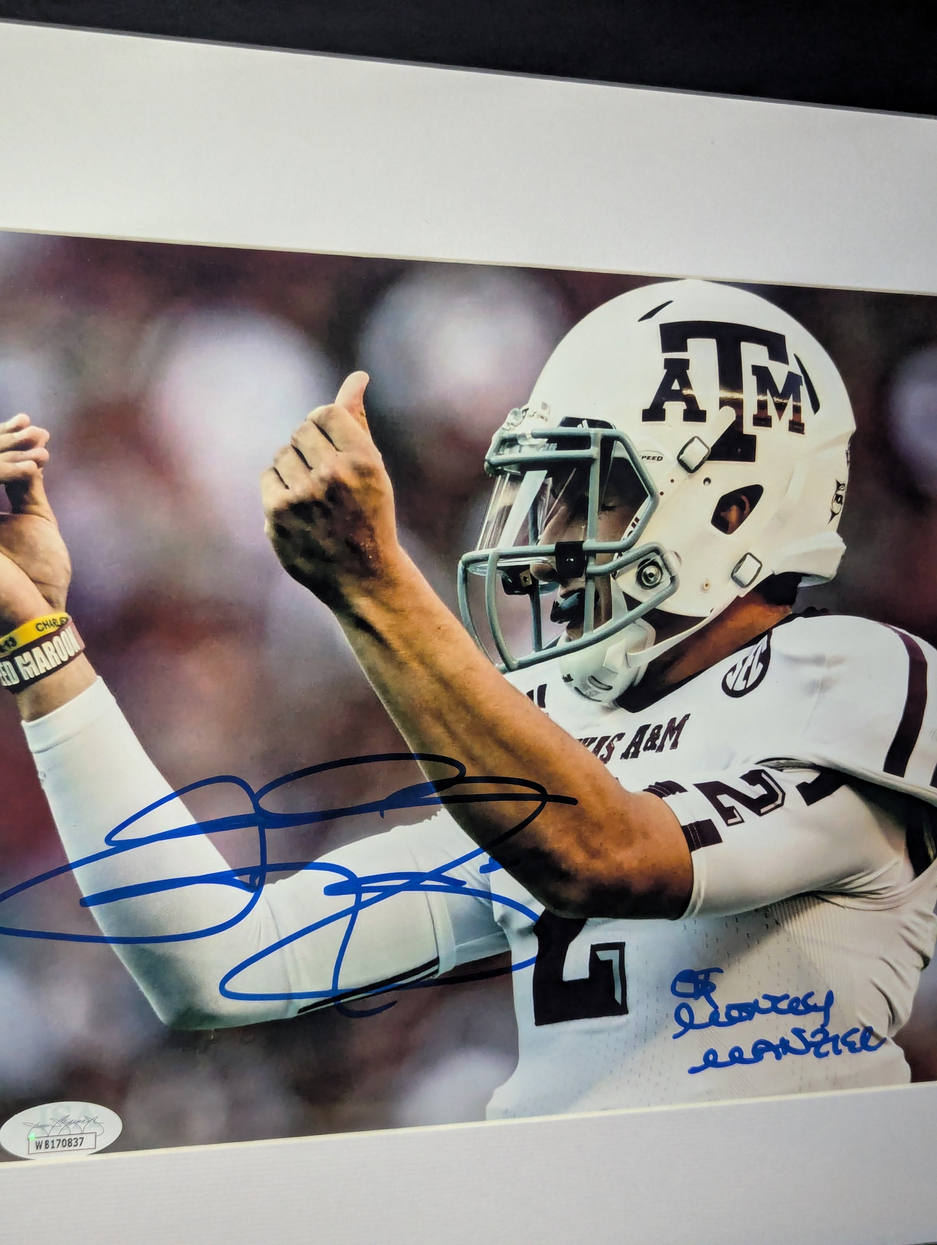 Signed Johnny Manziel "Money Manziel" 8x10 (JSA)