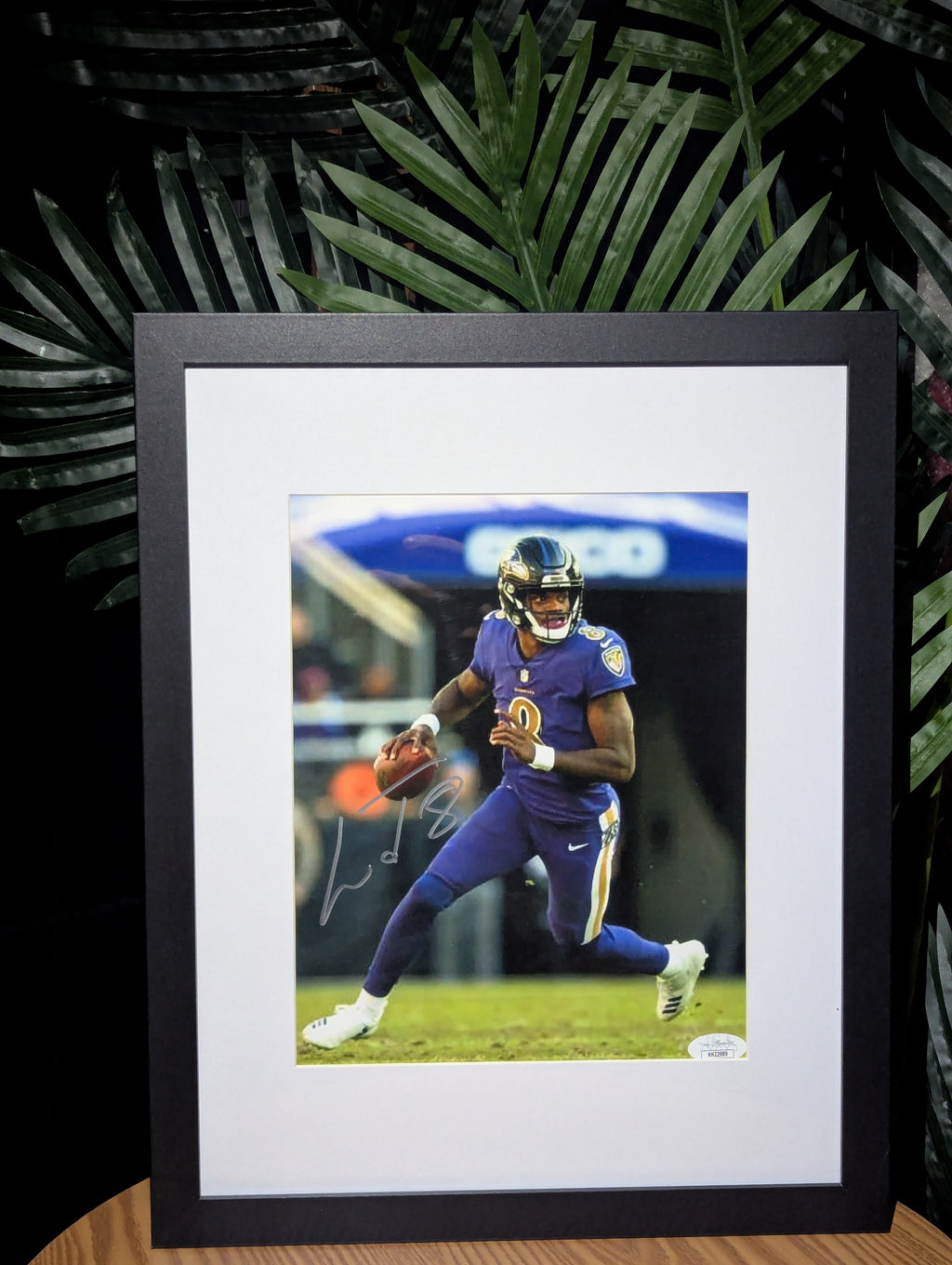 Signed Lamar Jackson 8x10 (JSA)