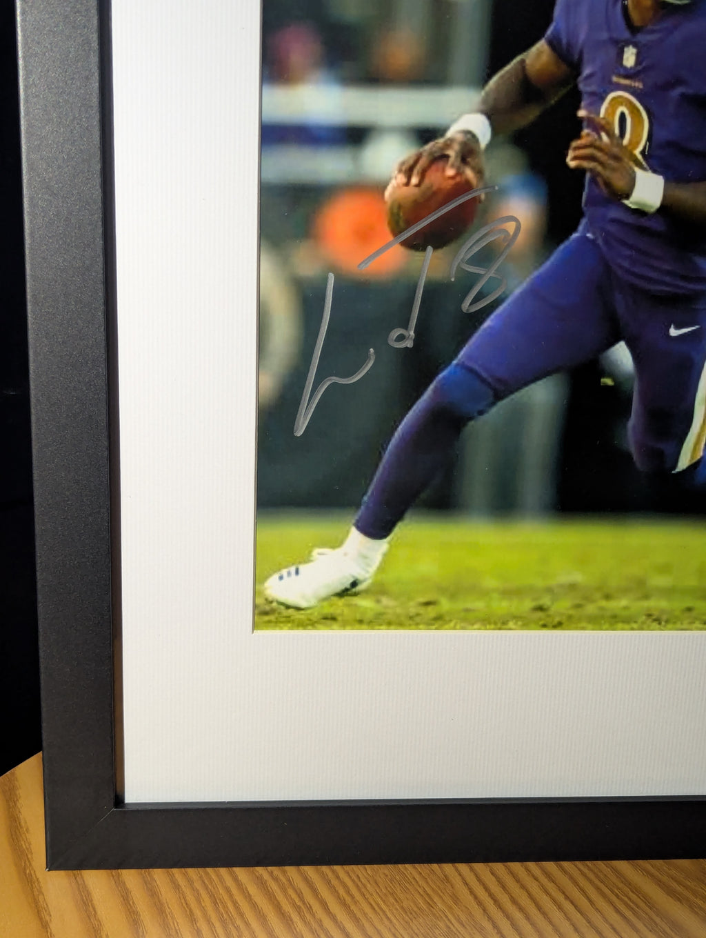 Signed Lamar Jackson 8x10 (JSA)