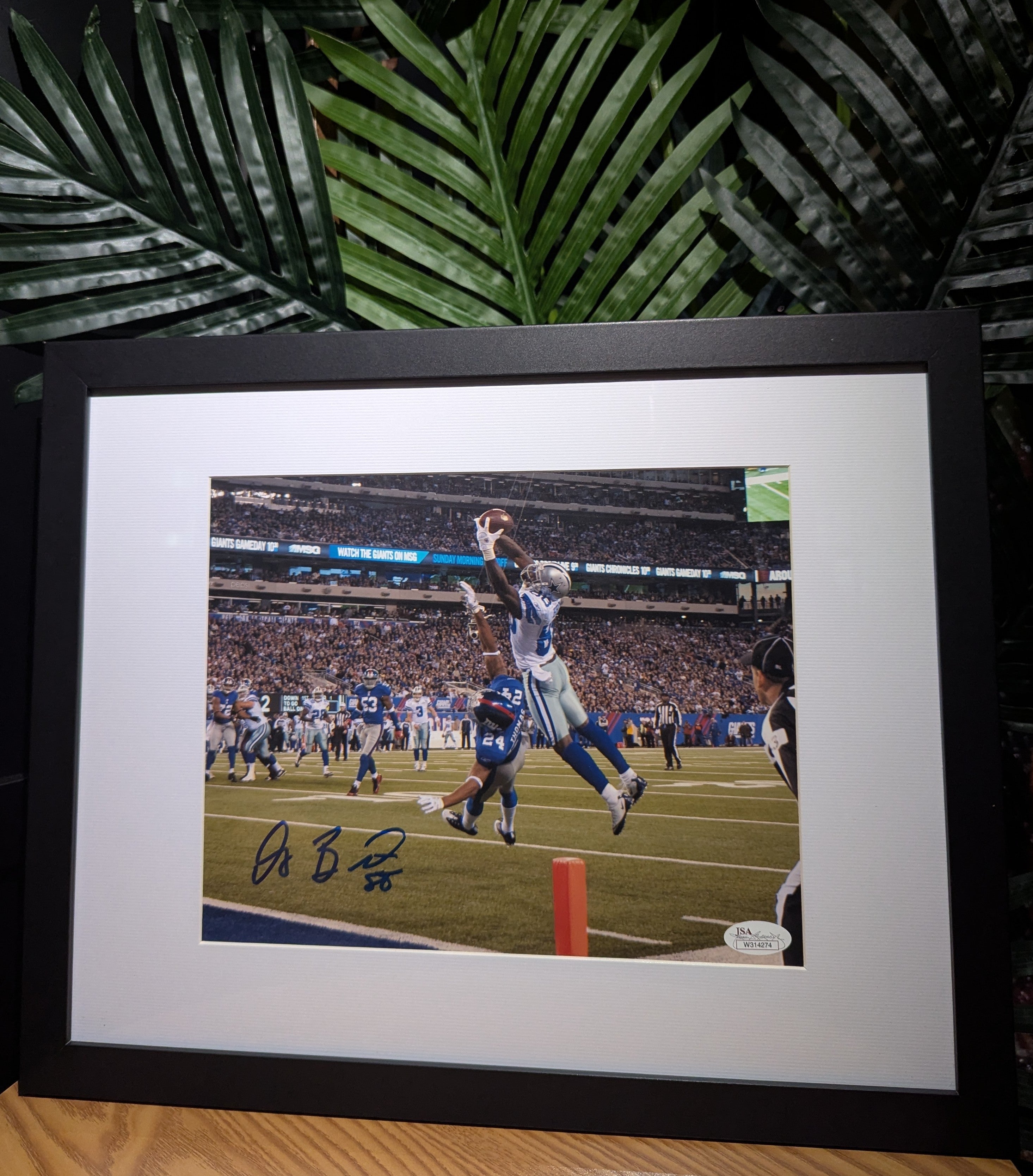 Signed Dez Bryant 8x10 (JSA)
