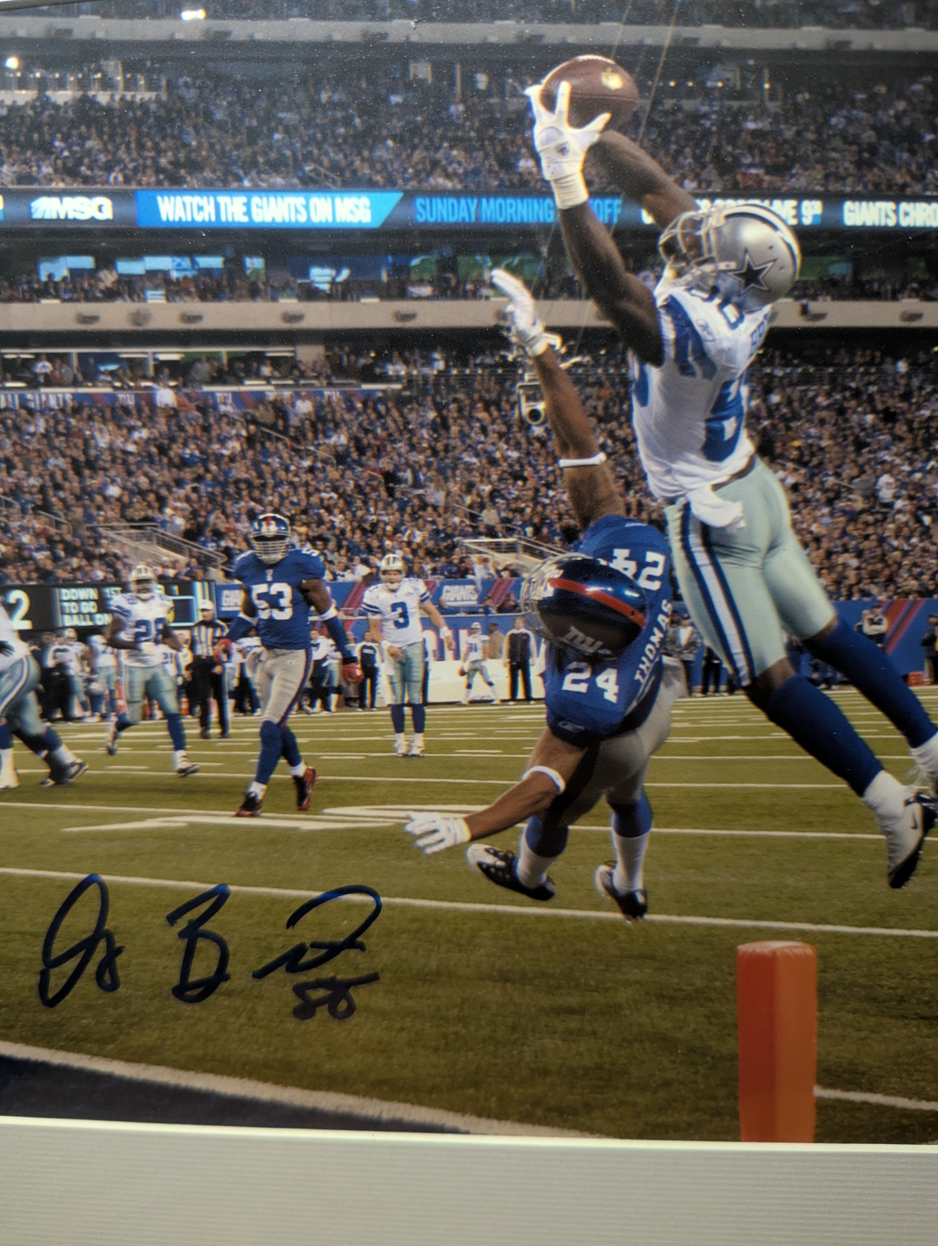 Signed Dez Bryant 8x10 (JSA)
